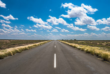 Vibrant Image Of Highway And Blue Cloudy Sky