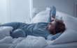 © StockPhotoPro - Depressed woman awake in the night, she is exhausted and suffering from insomnia
