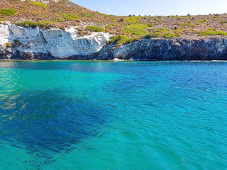 Wall Mural -  deep blue sea and island with small bushes