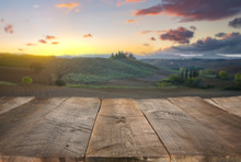 Empty Wooden Table With Italian Landscape On Background. Ideal For Product Placement