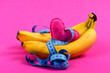 Fruit with pink heart and blue tape for measuring