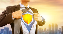 Businessman In Superhero Costume With Shield