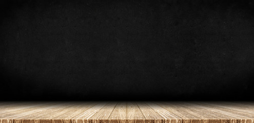 Leinwandbilder - Wood plank table top at black board stone wall background,Mock up for display or montage of product,Banner or header for advertise on social media