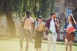 © LIGHTFIELD STUDIOS - multicultural students walking in park