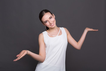 Wall Mural - Smiling woman standing with open arms