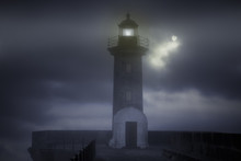 Lighthouse In A Foggy Night
