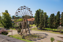 Aerial View To Rusty Abandoned Ferris Wheel In The Park In Ochamchira, Abkhazia