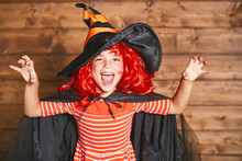 Funny Child Girl In Witch Costume In Halloween