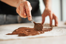 Professional Confectioner Making Tasty Cake With Melted Chocolate