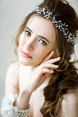 Wall Mural - Closeup brunette bride with fashion wedding hairstyle and makeup
