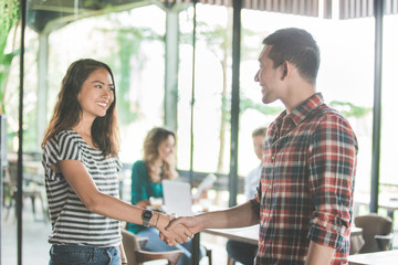 two partner shake hand