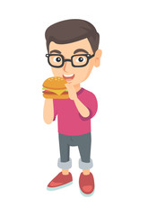 Canvas Print - Little caucasian boy eating a hamburger with appetite. Cheerful boy in glasses holding a big hamburger. Vector sketch cartoon illustration isolated on white background.