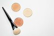 © vpavlyuk - Set of highlighters with cosmetic brush over a white background