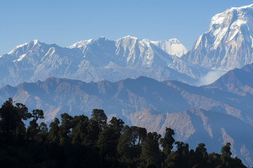 Wall Mural - Landscape image of mountain peak in Himalayas on blue sky background, Nepal