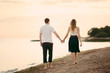 © Alexandr - Young happy couple on seashore