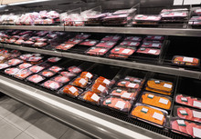 Shelves With Fresh Meat In Supermarket