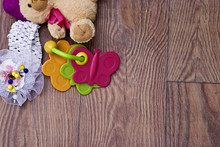 Children's Toy, Bandage And Teddy Bear On A Wooden Background