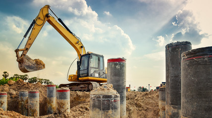 excavator blue sky heavy machine construction site soil excavate for foundation work by construction worker contractor for background construction concept