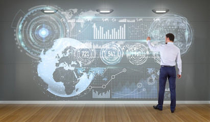 Poster - Businessman using graph screens interface on a wall 3D rendering