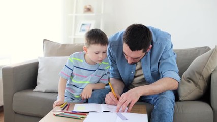 Poster - father and little son with crayons drawing at home