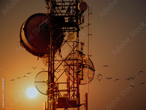 Fotografie, Tablou Telecommunication tower Antennas with sunset