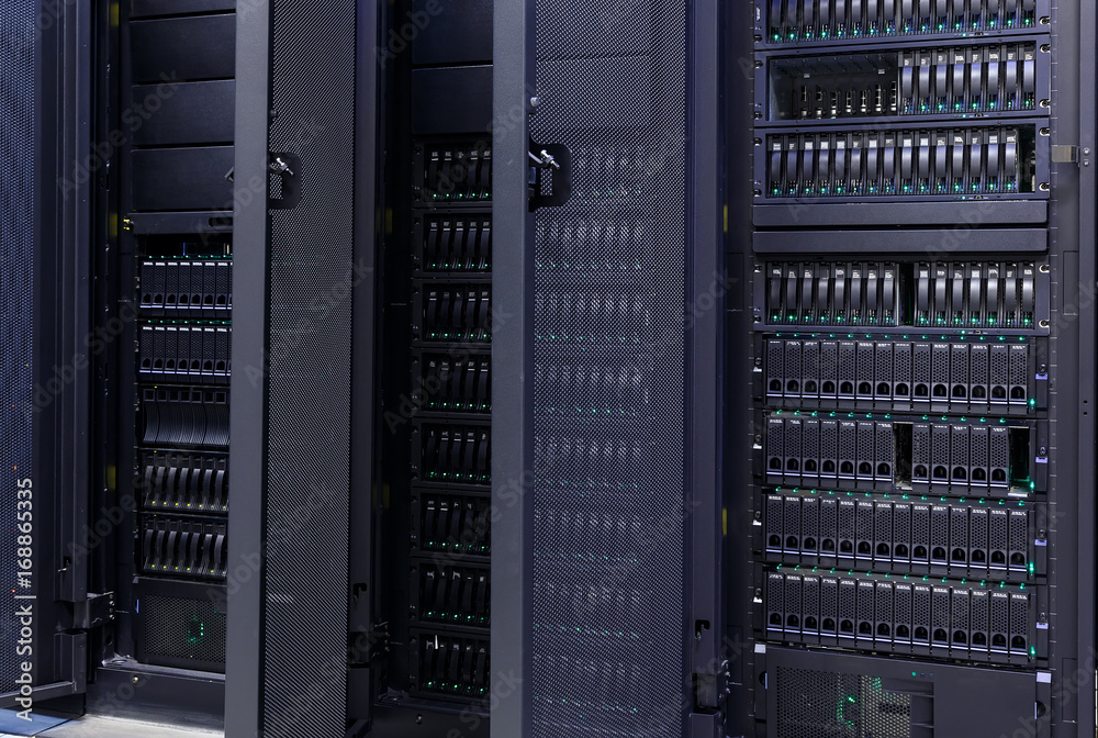Massive Storage Array Computer Row of supercomputers with large disk storage modern data center Stock ...