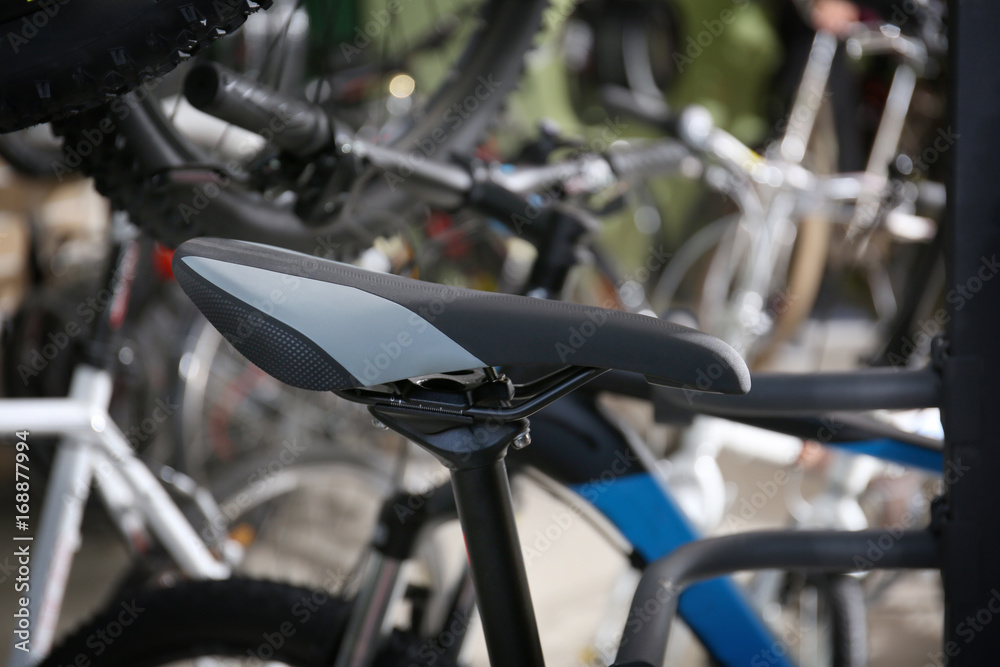 Seat of new modern bicycle in shop