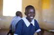 © Hugh Sitton - Portrait of smiling school girl in classroom
