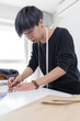 © MaaHoo/Stocksy - Design professional working in studio
