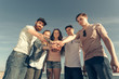 © fotofabrika - Multiracial Group of Friends with Hands on Stack