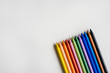 .Minimalist composition of plastic pencils of many different colors. Back to school photography