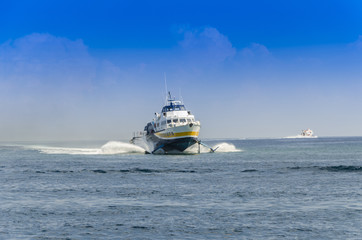 Two ferries sailing in the sea of the Aeolian Islands