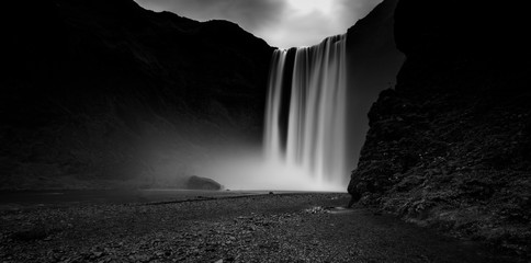 black and white picture of skogafoss, one of the most stunning waterfalls in iceland