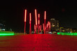 Red lightning posts in docklands at night. Dublin, Ireland.
