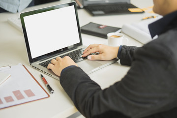 Leinwandbilder - Businessman using laptop when working on financial report