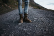© ADDICTIVE STOCK - Crop traveler in boots posing