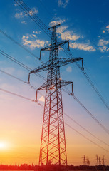 Wall Mural - high voltage pole at the sunset
