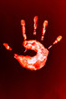 Isolated image of a child's palm red on a red background