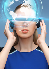 Wall Mural - woman in virtual reality 3d glasses with earth