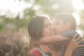 Poster - Single mom walking with son together with happy face