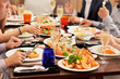 © DragonImages - Friends dining together