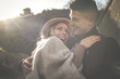 © liderina - Happy couple in embracing looking each other and smiling.