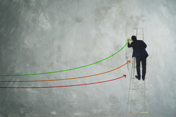 Wall Mural - Men drawing three arrow direction on grey wall .