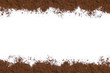 White background with ground coffee on below and above