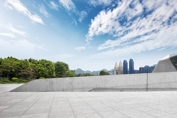 Wall Mural - empty marble floor and cityscape of modern city