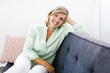 © Jessica Peterson/Tetra Images - Portrait of comfortable Mature woman