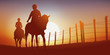 promenade à cheval - cavalier - cheval - équitation - randonnée - coucher de soleil