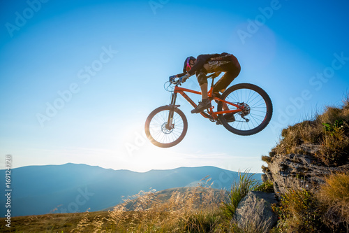 Fotomural Professional rider is jumping on the bicycle