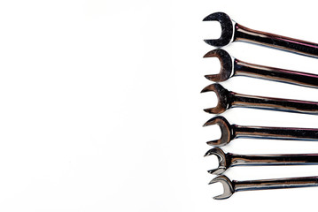 Top view of group of wrench arrange on white background. flat lay with copy space for mechanic tools concept