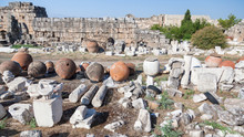 Antique Amphorae And Fragments Of Marble Columns In The Ancient City Of Hierapolis In Turkey